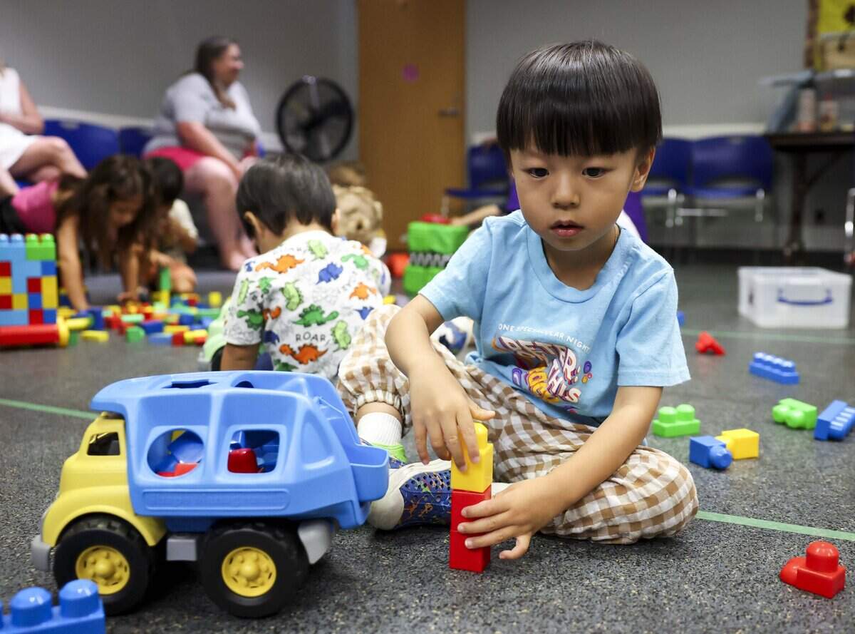 Doha Choi, 2, plays with toys during a Music and Movement class at the Southwest Regional Library on Thursday, July 9, 2026 in Fort Worth. The program designed for 3 to 5 year olds usually takes place from 10:30 to 11:15 a.m. on Thursdays.