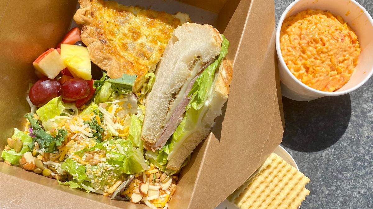 Lunch at the Kimbell Cafe: A ham-and-swiss sandwich with salad, quiche, fruit and a side order of the special house pimiento cheese.