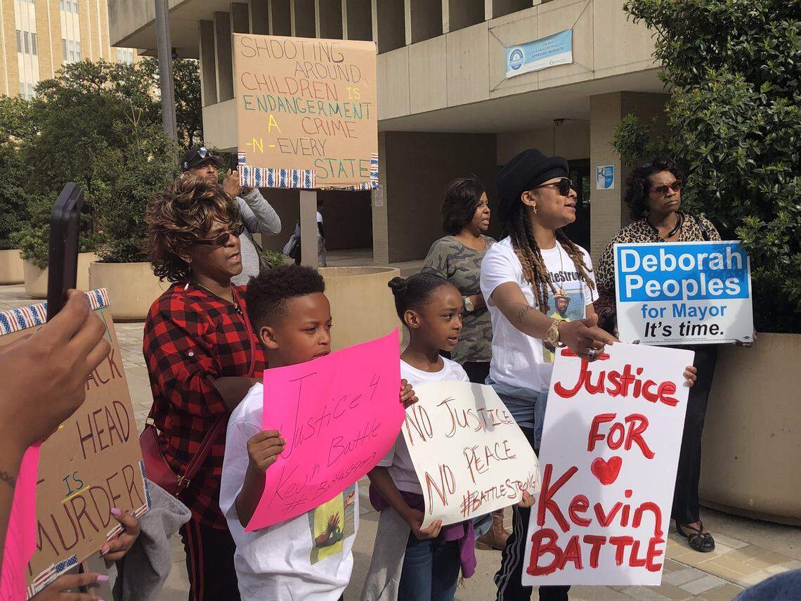 Protesters marched through downtown Fort Worth Friday, calling for charges to be filed against a man who shot and killed Kevin Battle on March 25. The man says he shot Battle in self-defense.