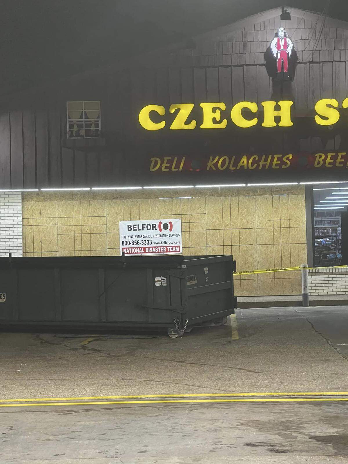 Windows at Czech Stop are boarded up Tuesday after an SUV crashed into the bakery Monday night.