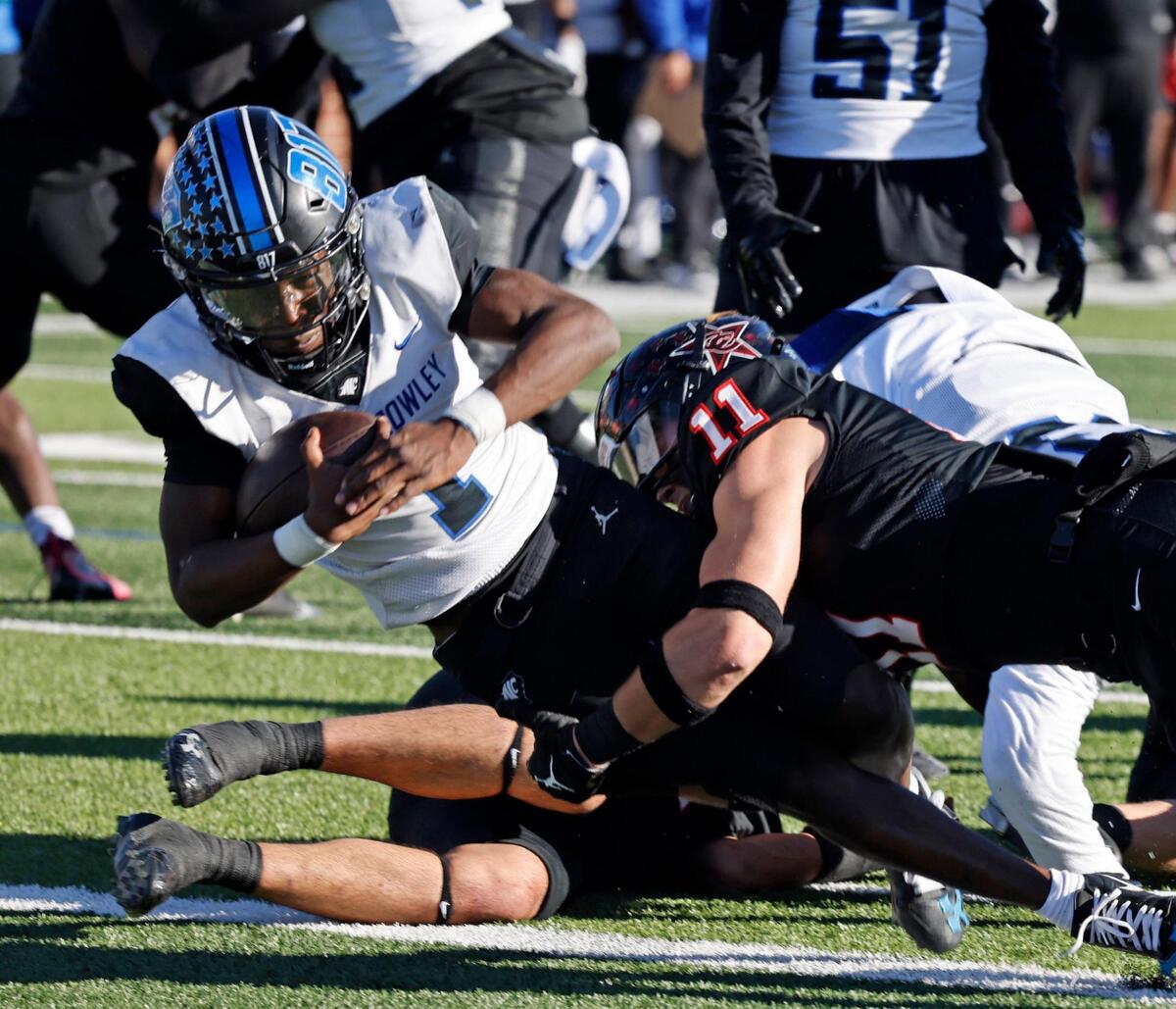 North Crowley running back Cornelius Warren (1) takes it in for two to tie the game at the half during the UIL District 6A D1 Regional football game at Vernon Newsom Stadium in Mansfield, Texas, Saturday, Nov. 30, 2024.