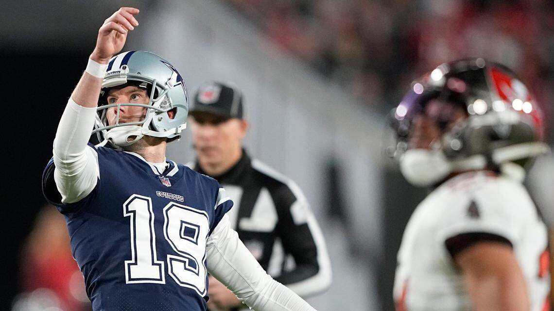 Dallas Cowboys place kicker Brett Maher (19) watches his extra point miss against the Tampa Bay Buccaneers in the NFC wild card round. He missed four PATs on Monday night.
