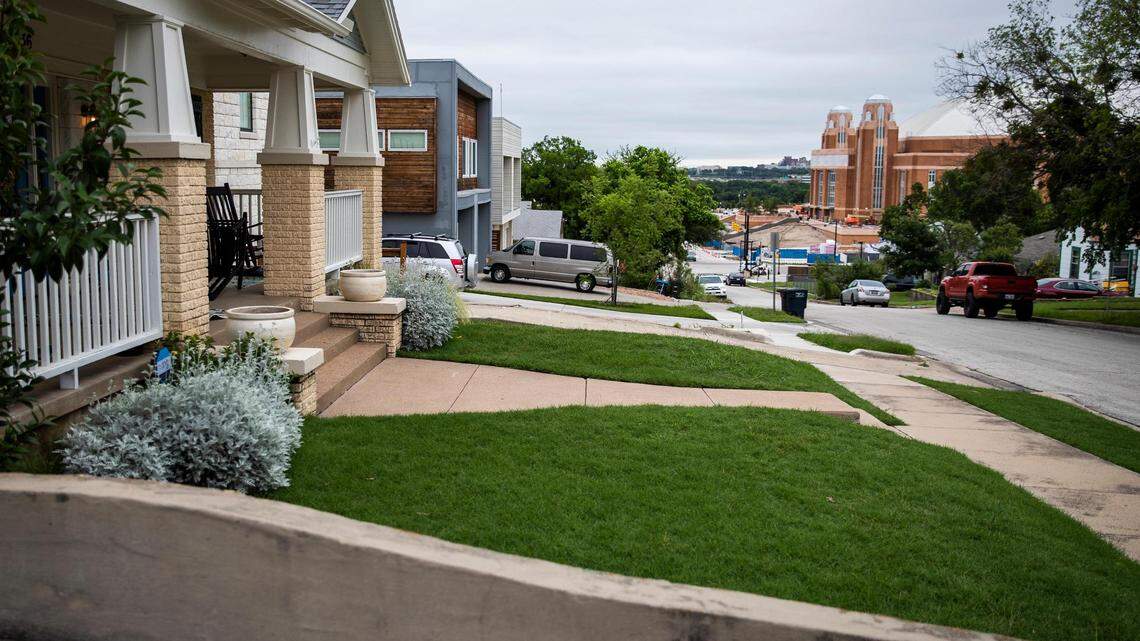 Homes along Harley Avenue face Dickies Arena in the Cultural District in Fort Worth.