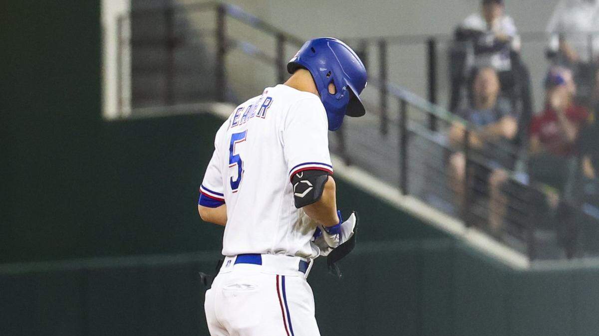 Texas Rangers shortstop Corey Seager (5) leaves the game with an injury during the fifth inning Tuesday against the Kansas City Royals at Globe Life Field.