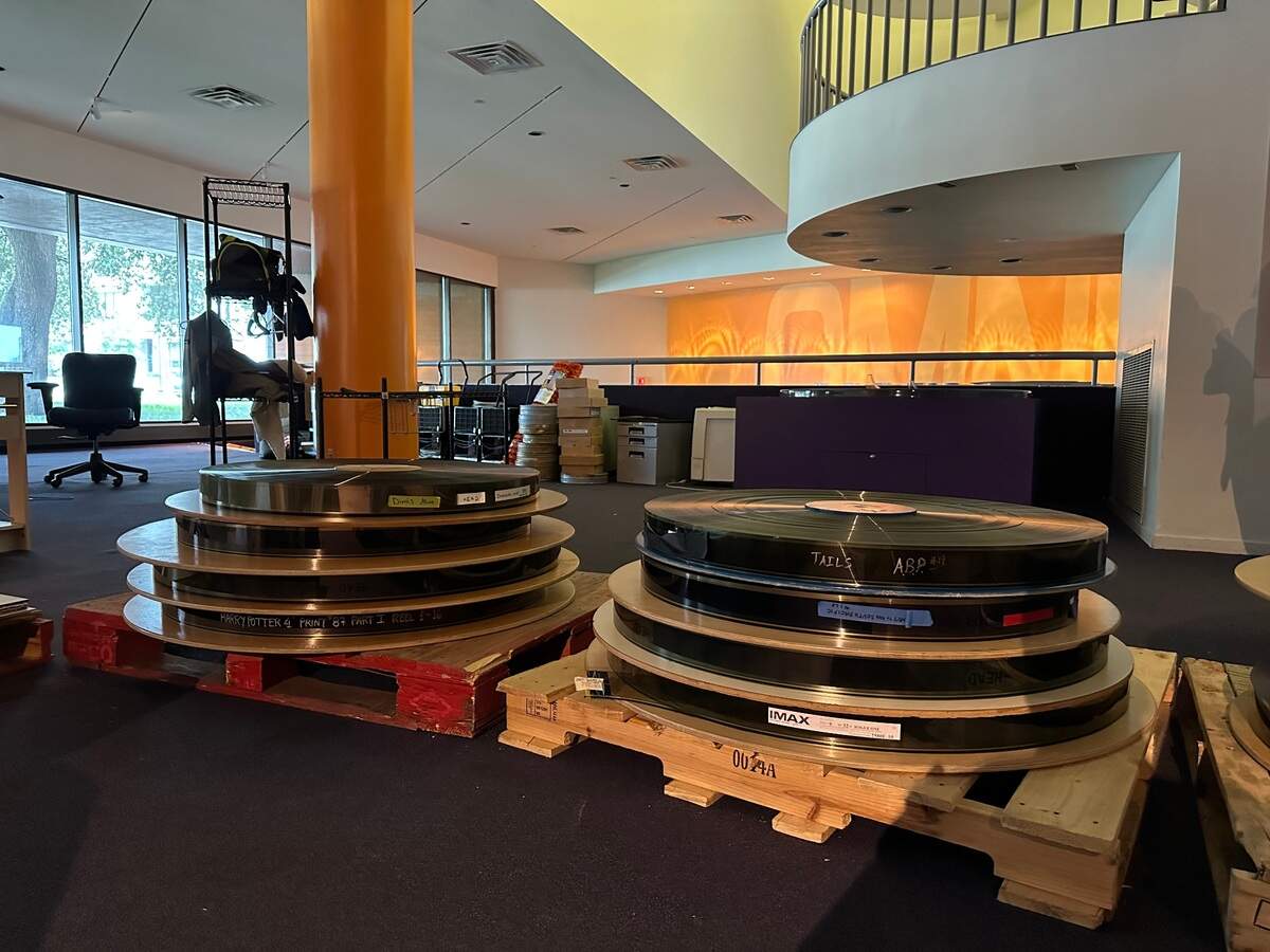 The Omni Theater’s lobby will be renovated into a larger open space that is more accessible to people with disabilities. OId IMAX film reels and other items in storage have been brought out in anticipation of construction beginning in early 2023. The theater is part of the Fort Worth Museum of Science and History.