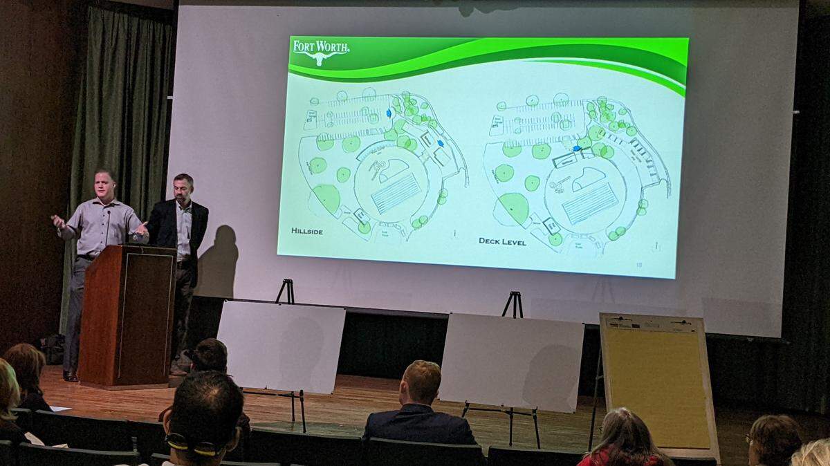 Stephen Springs, left, and Darren Bevard present two possible designs for the rebuilt Forest Park Pool.