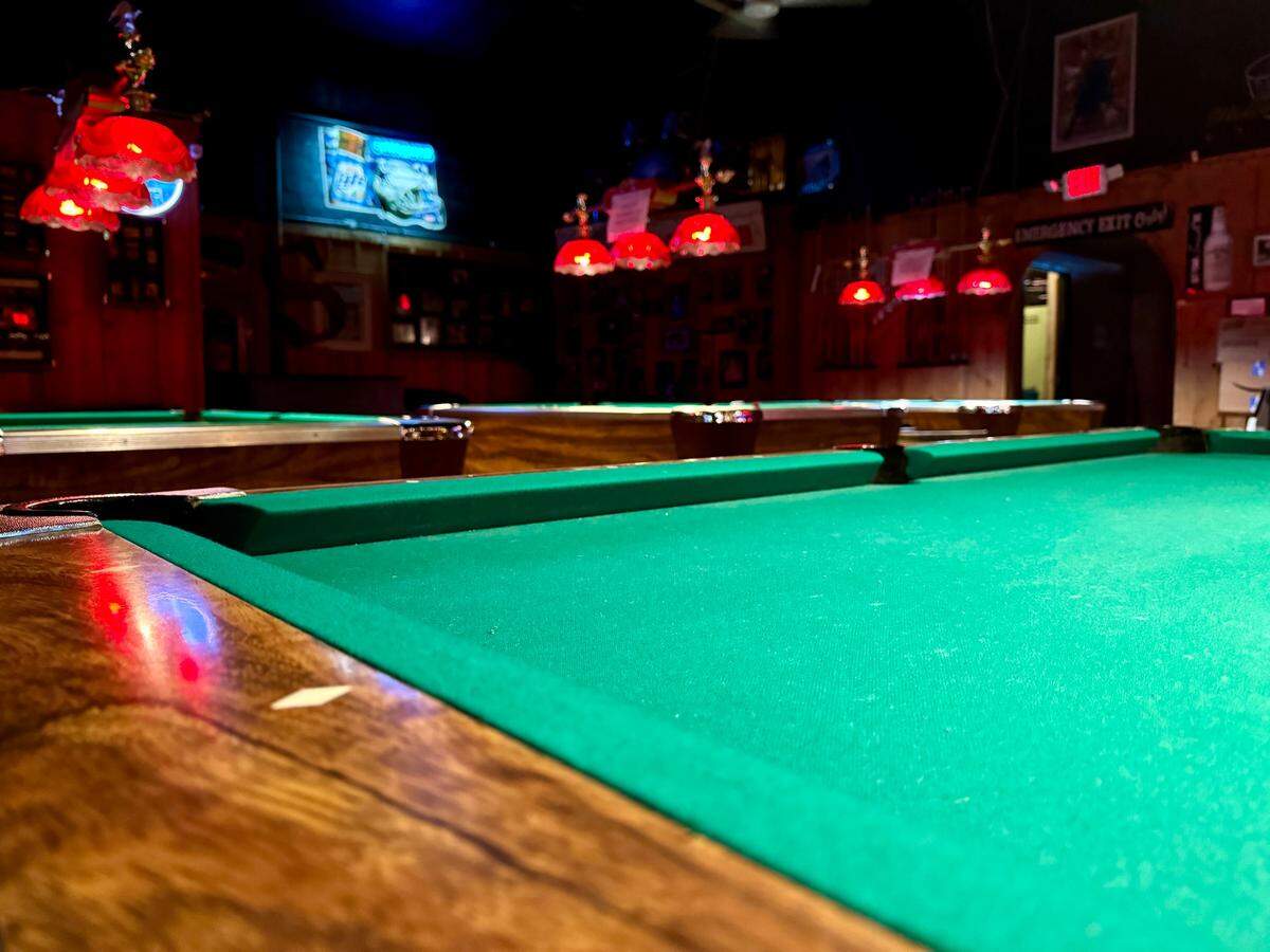 The Stagecoach Ballroom also features a seating area with pool tables.