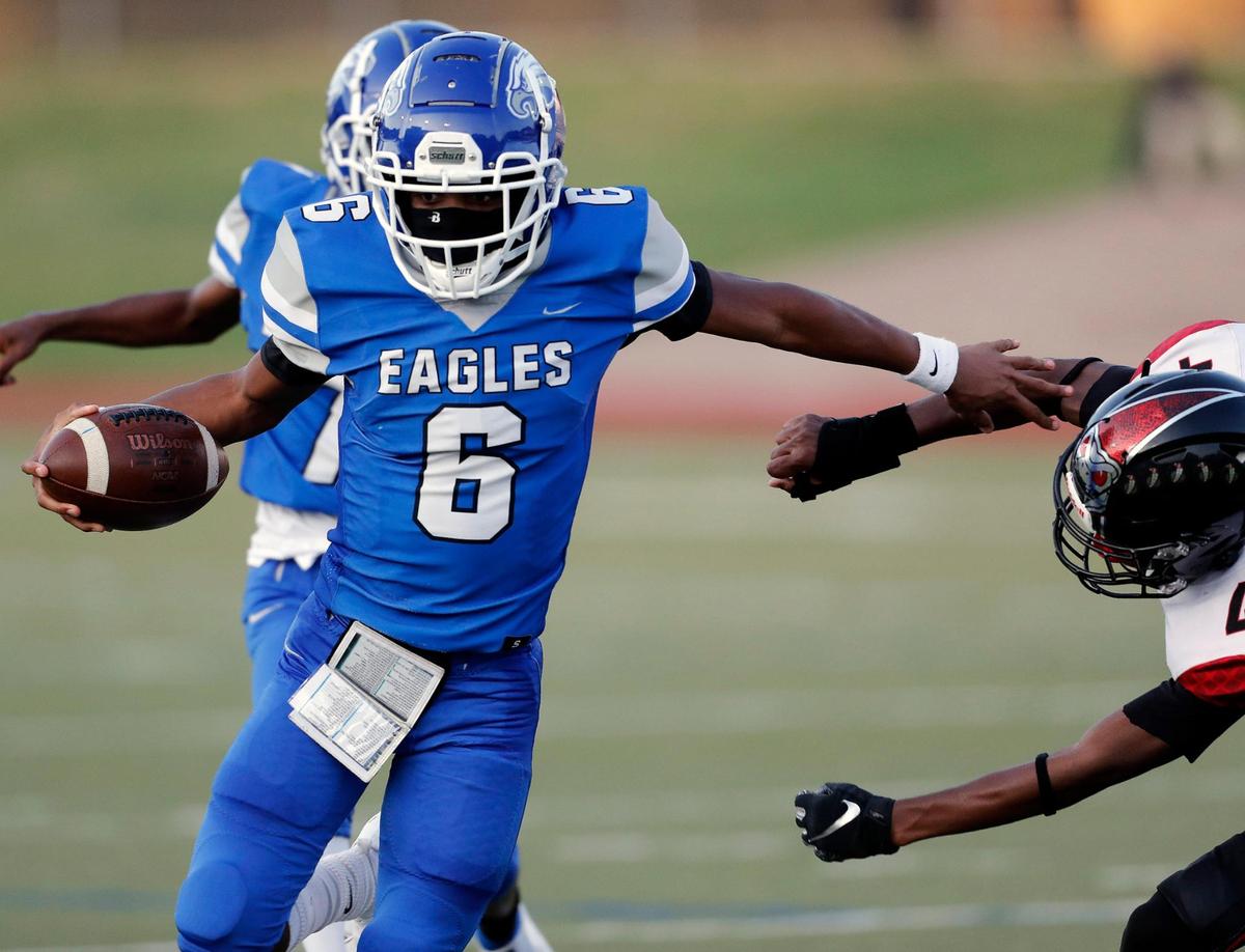Carter Riverside’s Marvelle Jacobs pushes away a Rattler on the way to the Eagles second touchdown during a high school football game at Farrington Field, in Fort Worth, Friday, Sept. 11, 2020. Carter Riverside defeated Crowley Atlas. (Special to the Star-Telegram Bob Booth)
