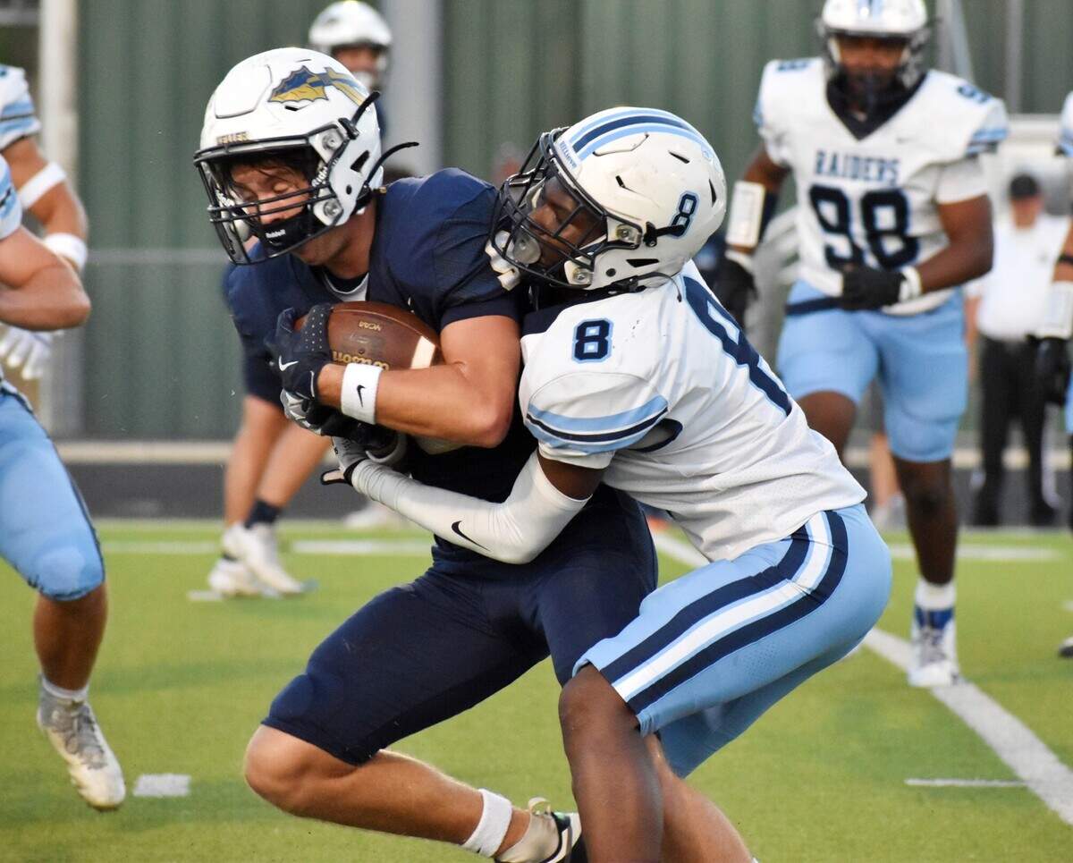 LD Bell’s Tre’von Taylor tackles Keller wide receiver Brock Meek during a UIL football game at KISD Athletic Complex in Keller on Thursday, Sept. 19, 2024.