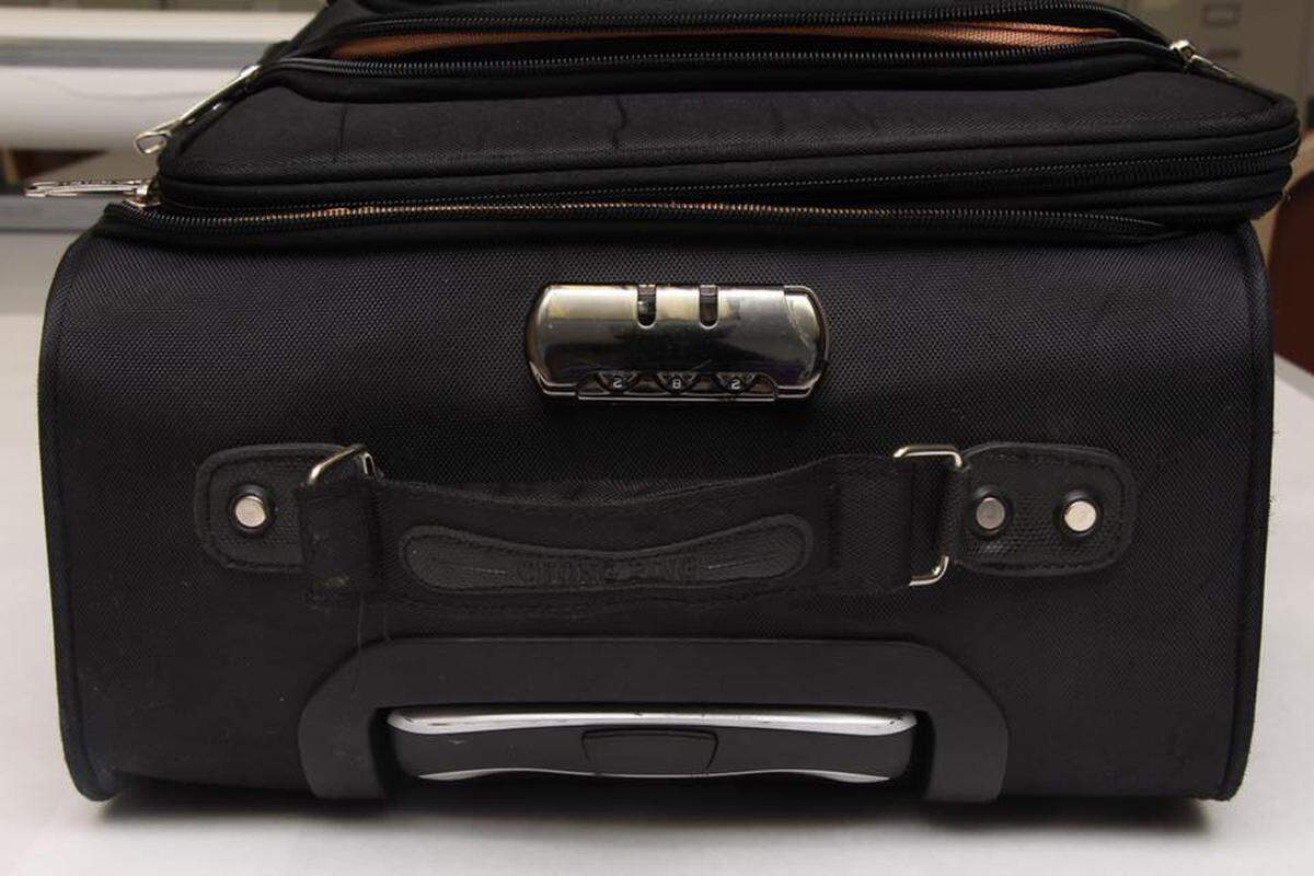 Arlington police on Tuesday released this image of a black suitcase in which a newborn baby boy was found on Saturday morning. The boy is recovering, police said, and the department is looking for the identity of the mother.