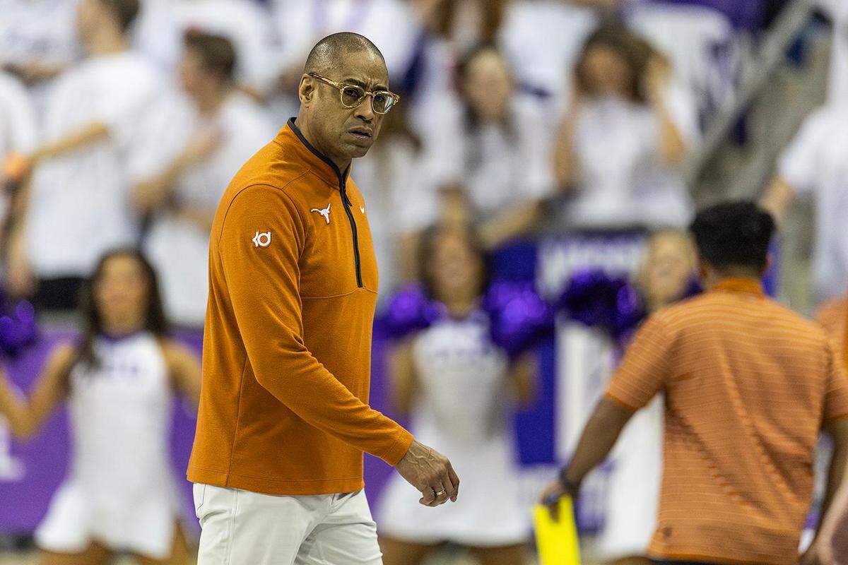 Texas Head Coach Rodney Terry walks off the court during the timeout during a Big XII match up between the TCU Horned Frogs and Texas Longhorns at Schollmaier Arena on Saturday.