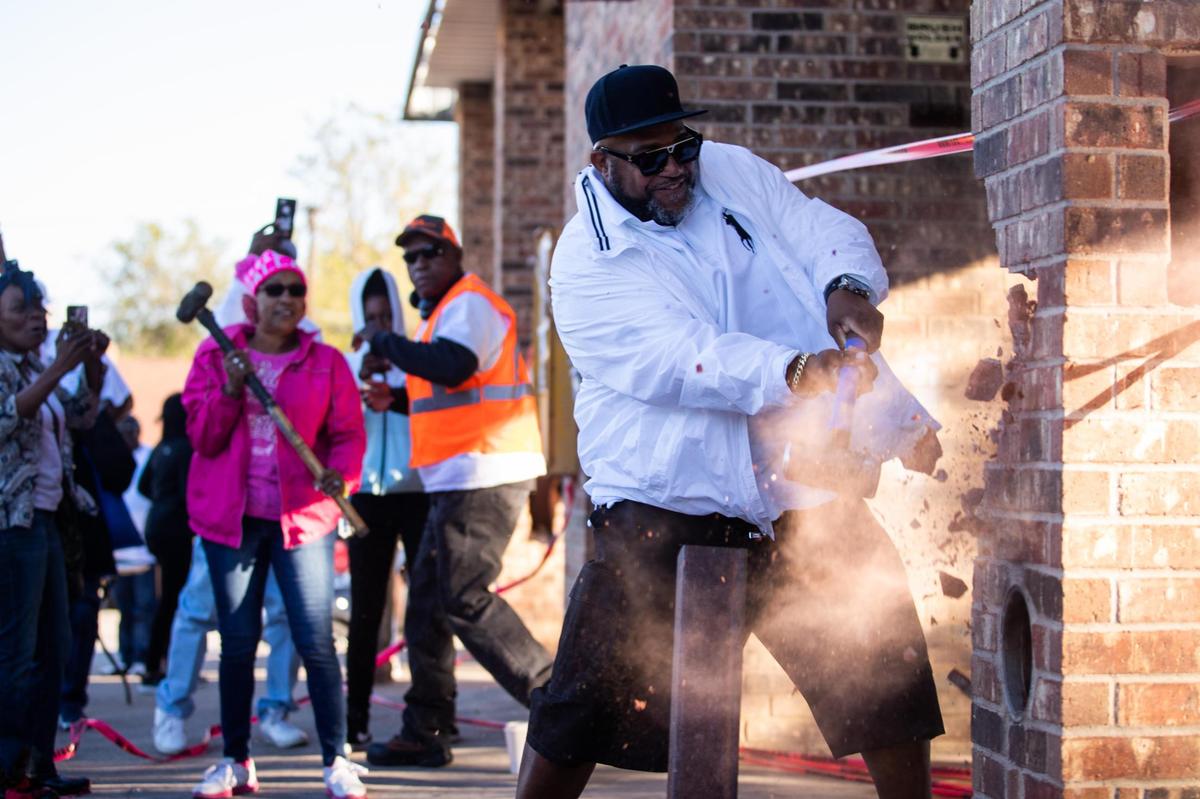 Mike Clay ceremonially started the demolition of a car wash Thursday on Horne Street in Como.