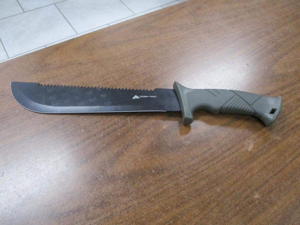 A man believed to be in crisis was taken into custody Friday morning after several 911 callers reported he was armed with a machete and walking down a four-lane highway while waving the weapon in the air, White Settlement police said.