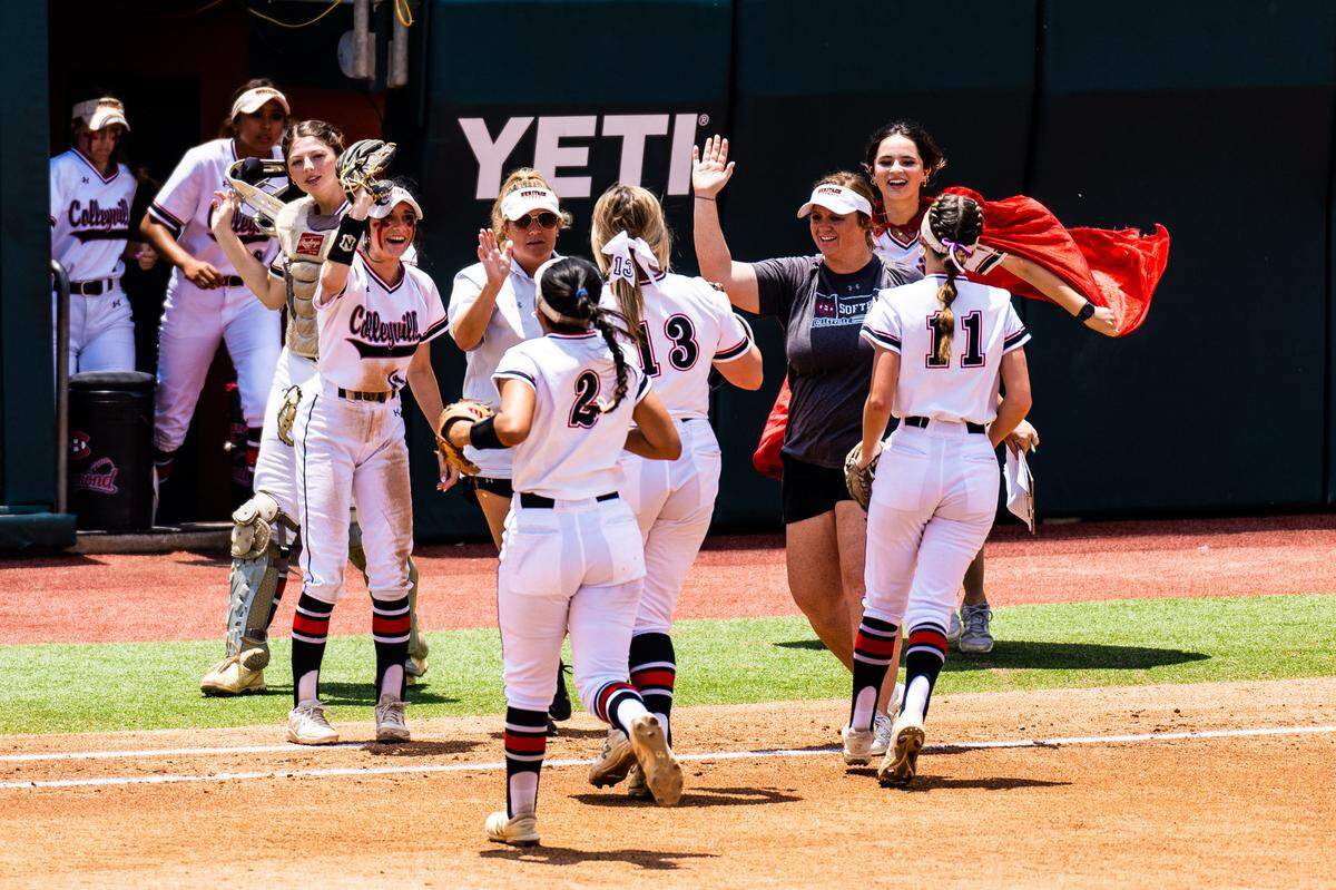 Colleyville Heritage players and coaches celebrate at the end of an inning against New Braunfels Canyon in a Class 5A state semifinal on Friday, June 2, 2023 at McCombs Field in Austin, TX.