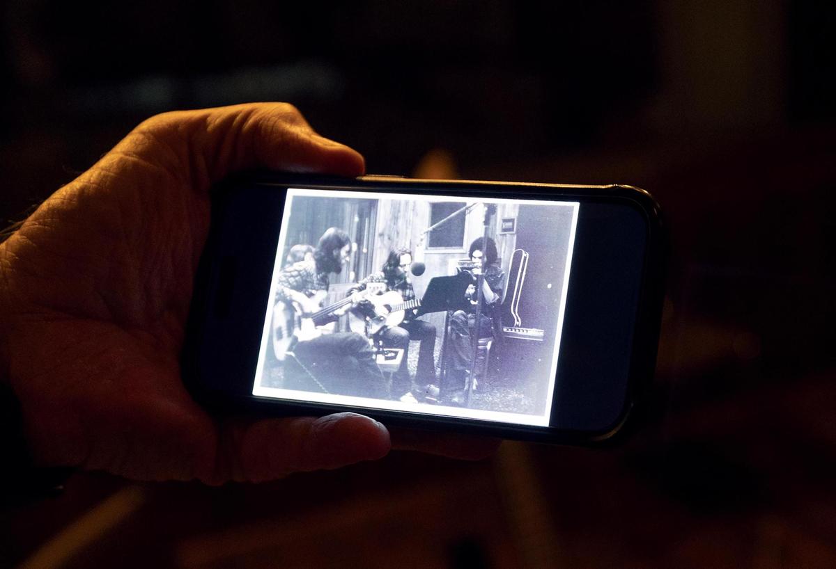 Audio Dallas Recording Studio owner Paul Osborne shows a photograph of Willie Nelson recording at the studio in Garland 50 years ago. The city will be celebrating the 50th anniversary of the release of “Red Headed Stranger” with numerous activities.