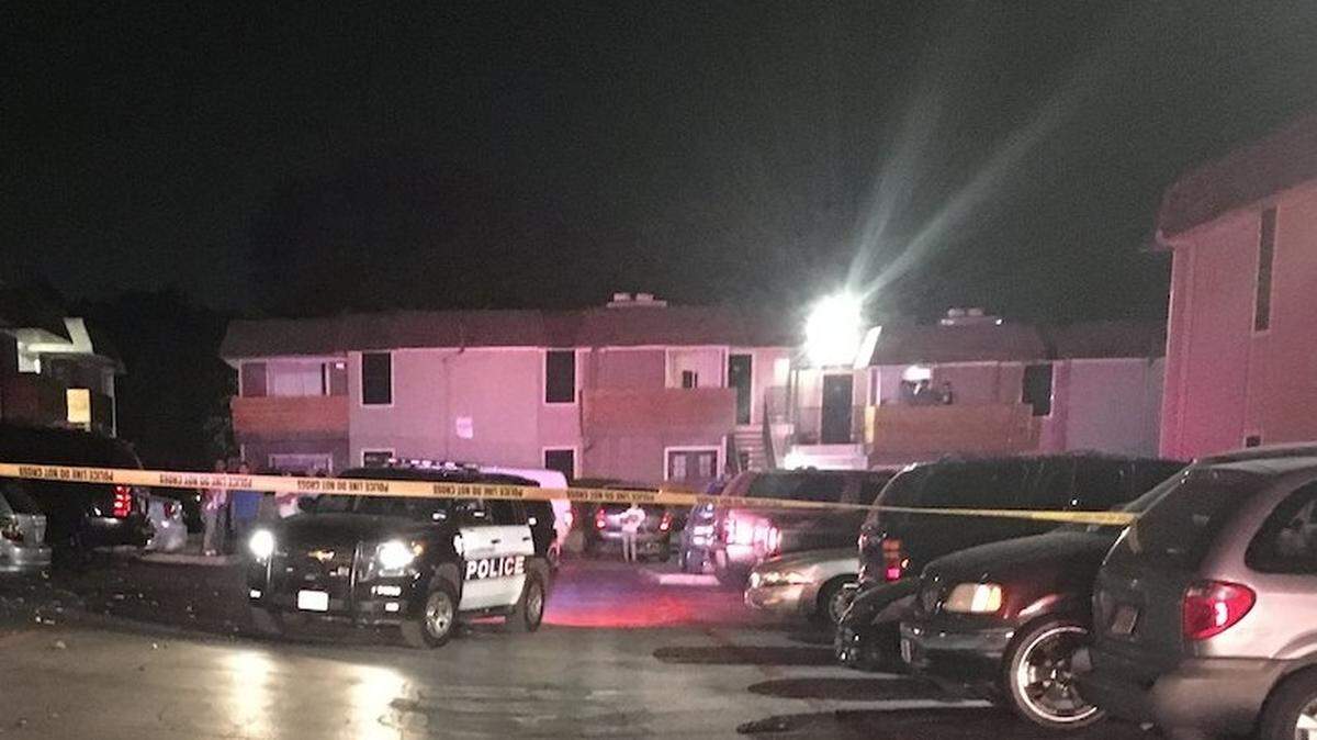 Two people were wounded Tuesday night when a gunman fired through an apartment door at a Grapevine complex, police said.