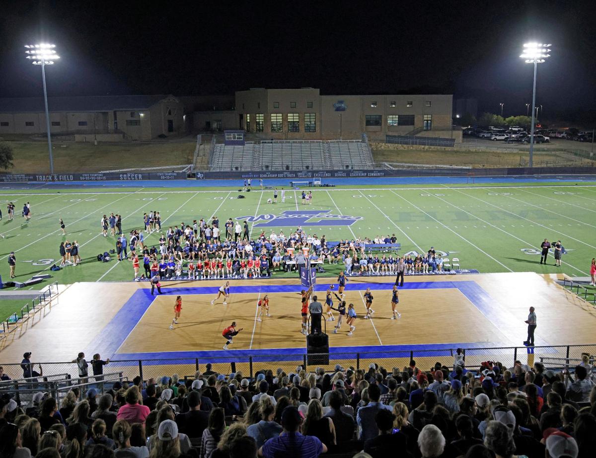 Fans filled the home side of Warrior Stadium for the Showdown at Sundown outdoor exhibition volleyball game between Grapevine and Liberty Christian at Liberty Christian High School in Argyle, Texas, Tuesday, Oct. 29, 2024.