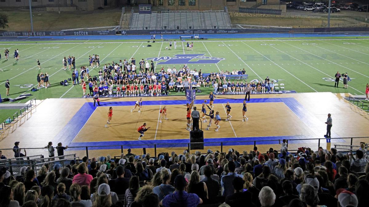 Fans filled the home side of Warrior Stadium for the Showdown at Sundown outdoor exhibition volleyball game between Grapevine and Liberty Christian at Liberty Christian High School in Argyle, Texas, Tuesday, Oct. 29, 2024.