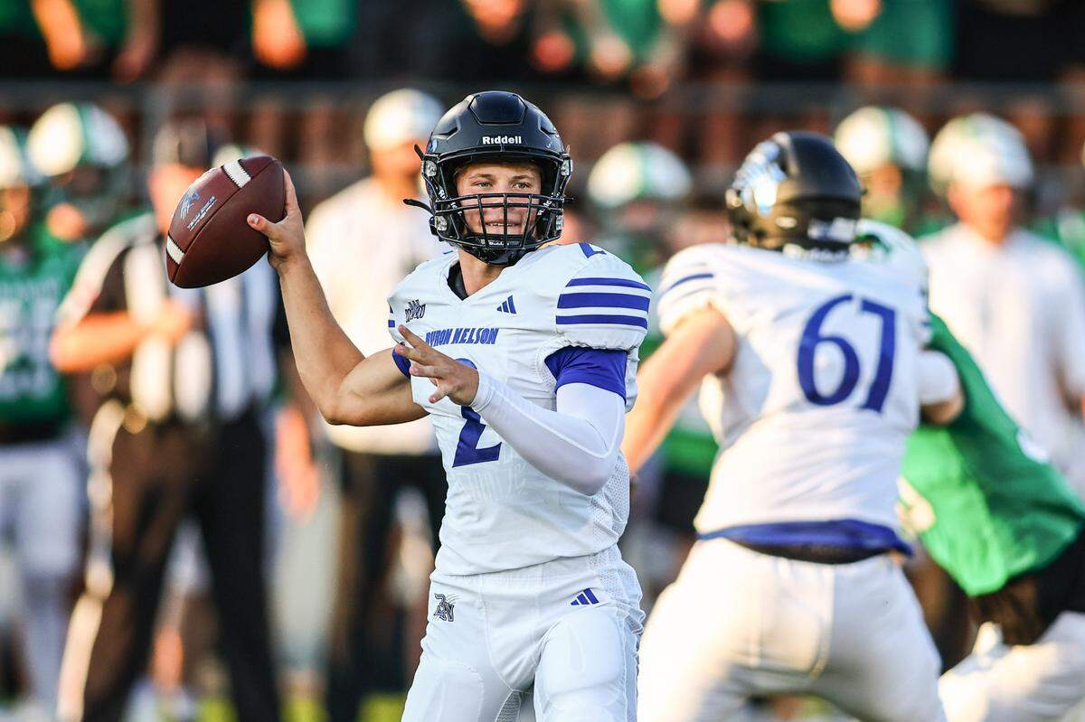 Trophy Club Byron Nelson quarterback Grant Bizjack throws a pass against Southlake Carroll on Friday, September 13, 2024 at Dragon Stadium in Southlake, Texas.