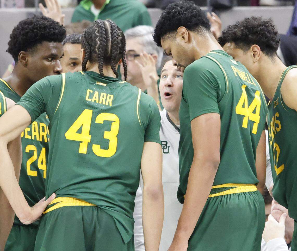 Baylor head coach Scott Drew talks to the team during a time out in the second half of a NCAA basketball game between Baylor University and TCU at Schollmaier Arena in Fort Worth, Texas, Saturday Jan. 03, 2026
