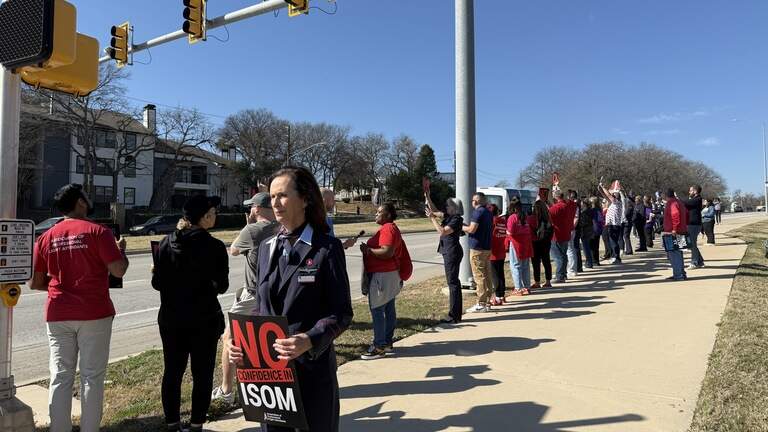 American Airlines flight attendants protest, call for CEO Robert Isom to step down