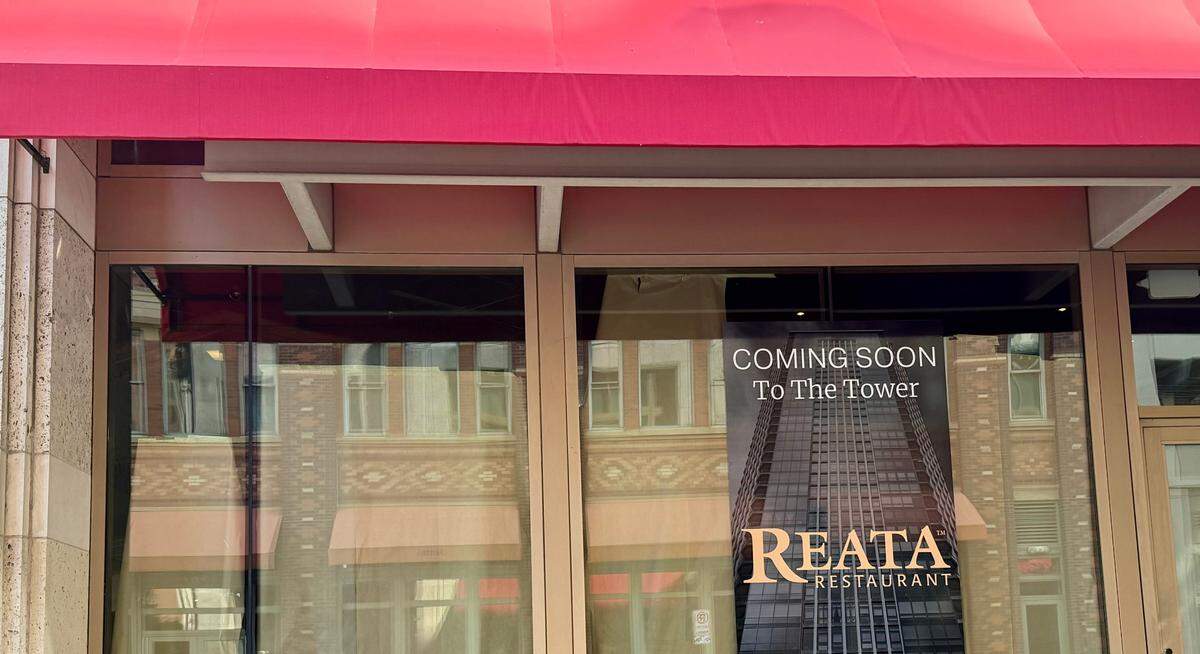 Reata’s vermilion red awnings are up but the windows remain covered at its new Throckmorton Street location, a return to The Tower building where it originally opened on the top floor in 1996.