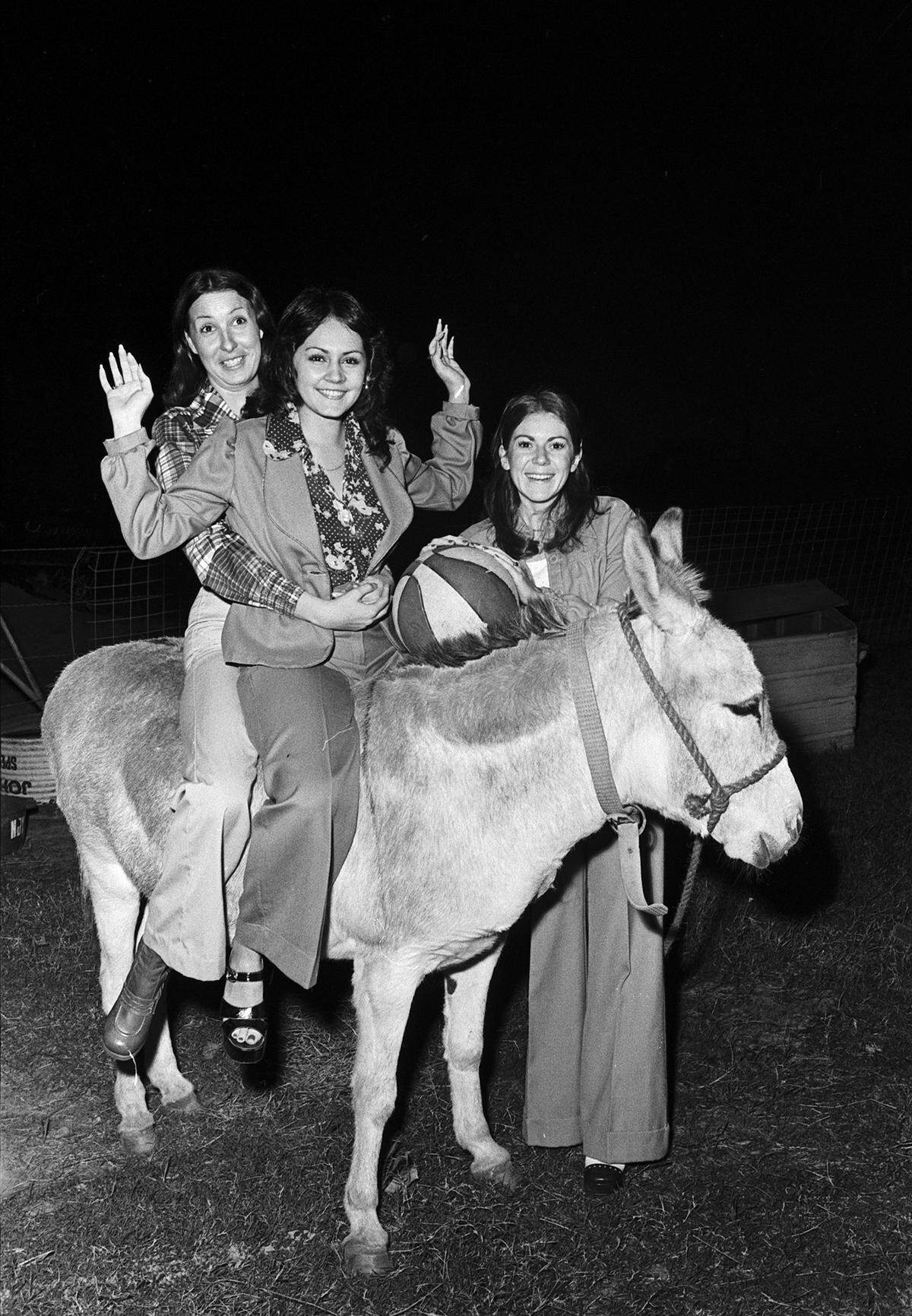Dec. 6, 1973: Bauder Fashion College students, left to right, Kathy Riche, Bonnie Cervantes and Carol Smith were among the students participating in a donkey basketball game at the University of Texas at Arlington to benefit Arlington’s Christmas Samaritans.