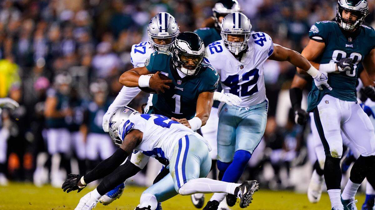 Philadelphia Eagles quarterback Jalen Hurts (1) is brought down by Dallas Cowboys safety Malik Hooker during their game earlier this season.