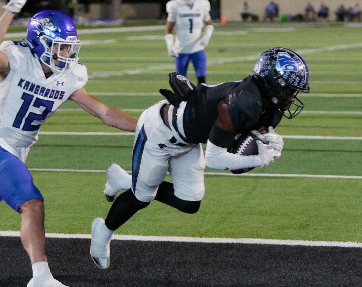 North Crowley’s Quentin Gibson catches a touchdown pass during a UIL football game at Crowley ISD Multi Purpose Stadium on Friday, October 18, 2024.