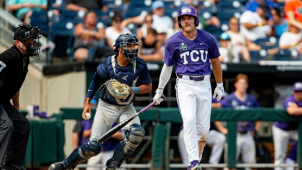 TCU’s Elijah Nunez, right, reacts after striking out against Oral Roberts in Friday’s loss in the opening game of the College World Series.