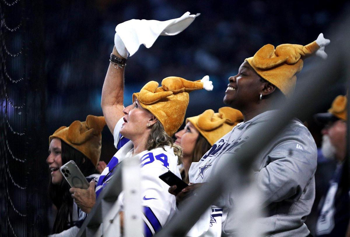 Dallas Cowboys fans cheer as their team takes the field on Thanksgiving to take on the New York Giants on Thursday, November 24, 2022, at AT&T Stadium in Arlington.