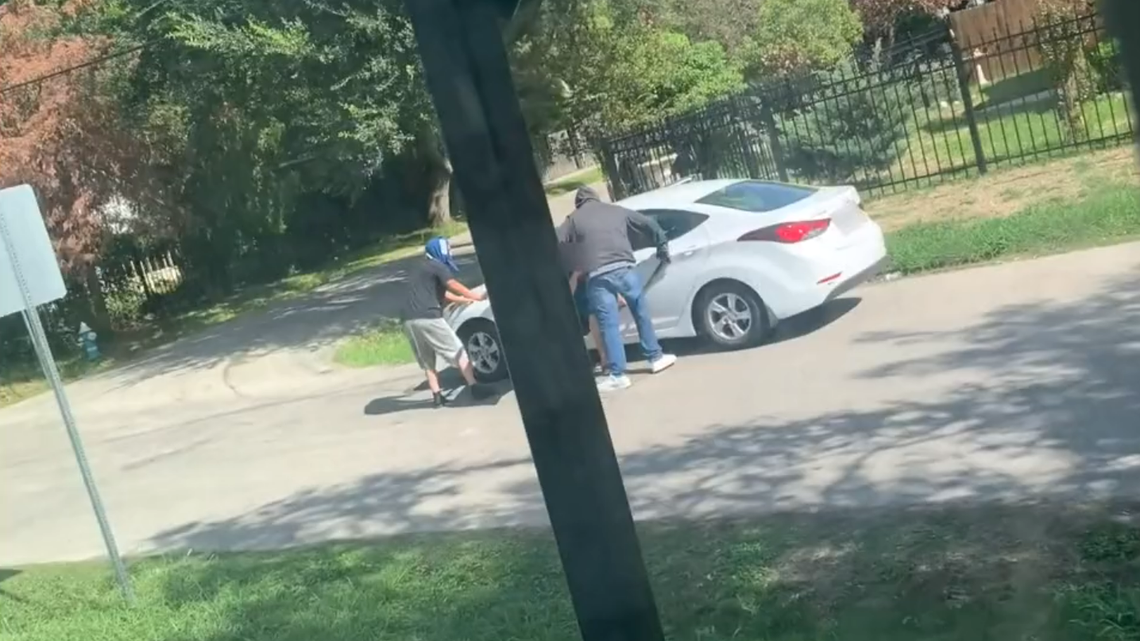 A woman said she was pulled over to check her GPS when she was carjacked in Houston.