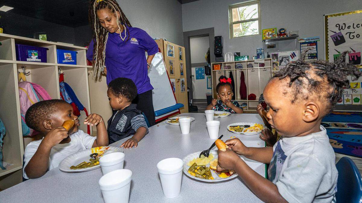 Toddler teacher Breaunna King looks after her students during lunch break at Sunrise Early Learning and Development Center in Fort Worth on Thursday, Oct. 26, 2023.