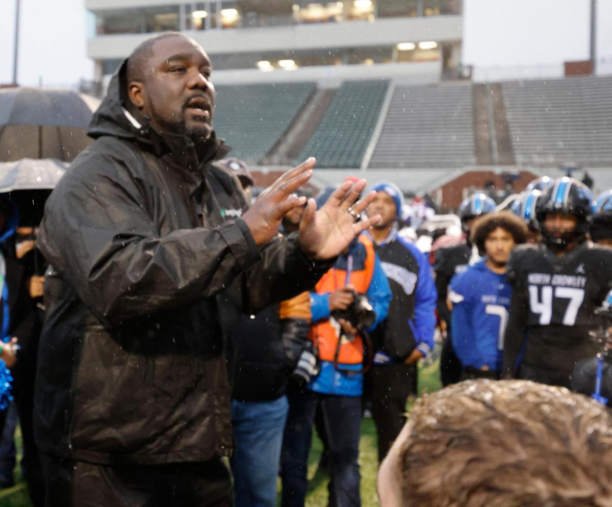 North Crowley head coach Ray Gates talks to the team after winning a Class 6A Division I quarterfinal Dec. 7, 2024, at Vernon Newsom Stadium in Mansfield.