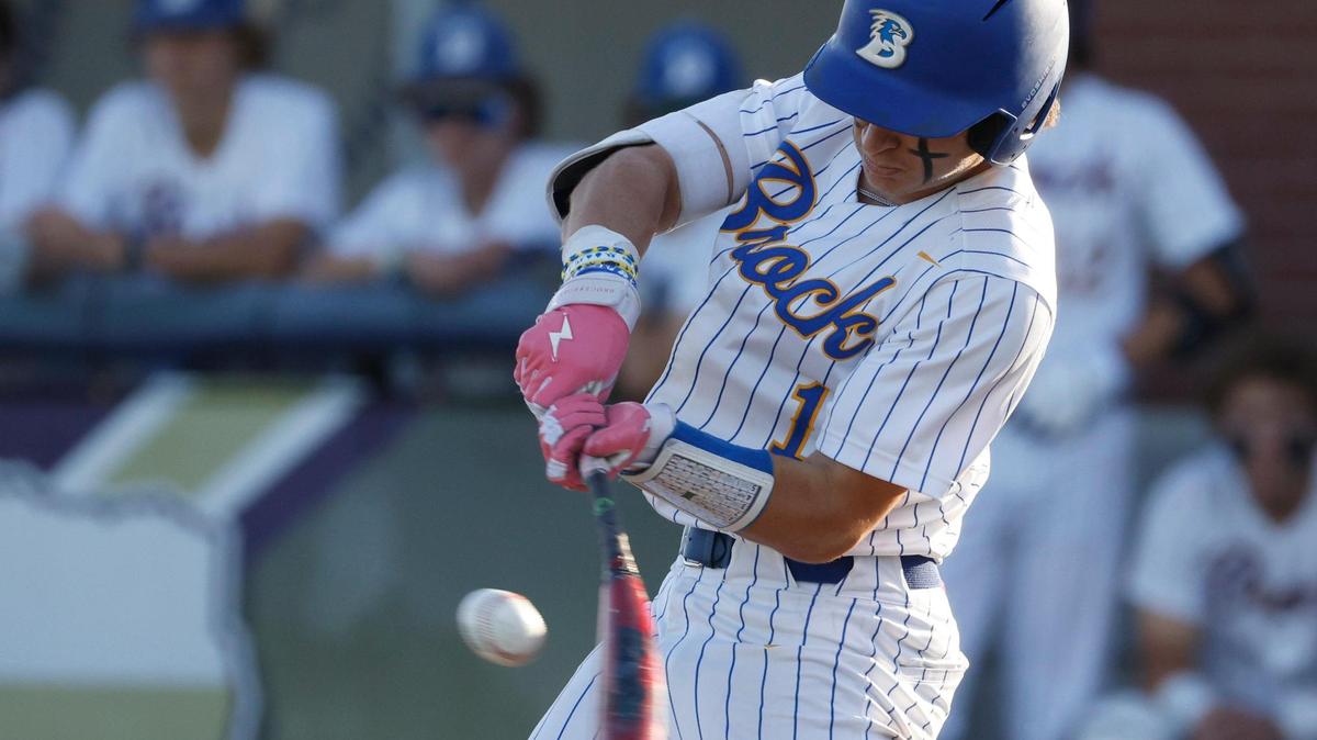 Brock center fielder Jesse Rusinek (1) and the Eagles are heading to the state semifinals.
