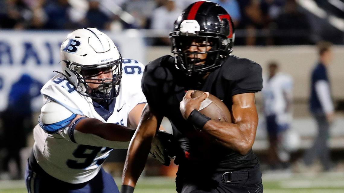 L.D. Bell defensive lineman Isaiah Ramos (99) chases Trinity running back Gary Maddox (3) in the backfield in the first half of a District 3-6A high school football game at Pennington Field in Bedford, Texas, Thursday, Nov. 03, 2022. Trinity led L.D. Bell 14-7 at the half.(Special to the Star-Telegram Bob Booth)