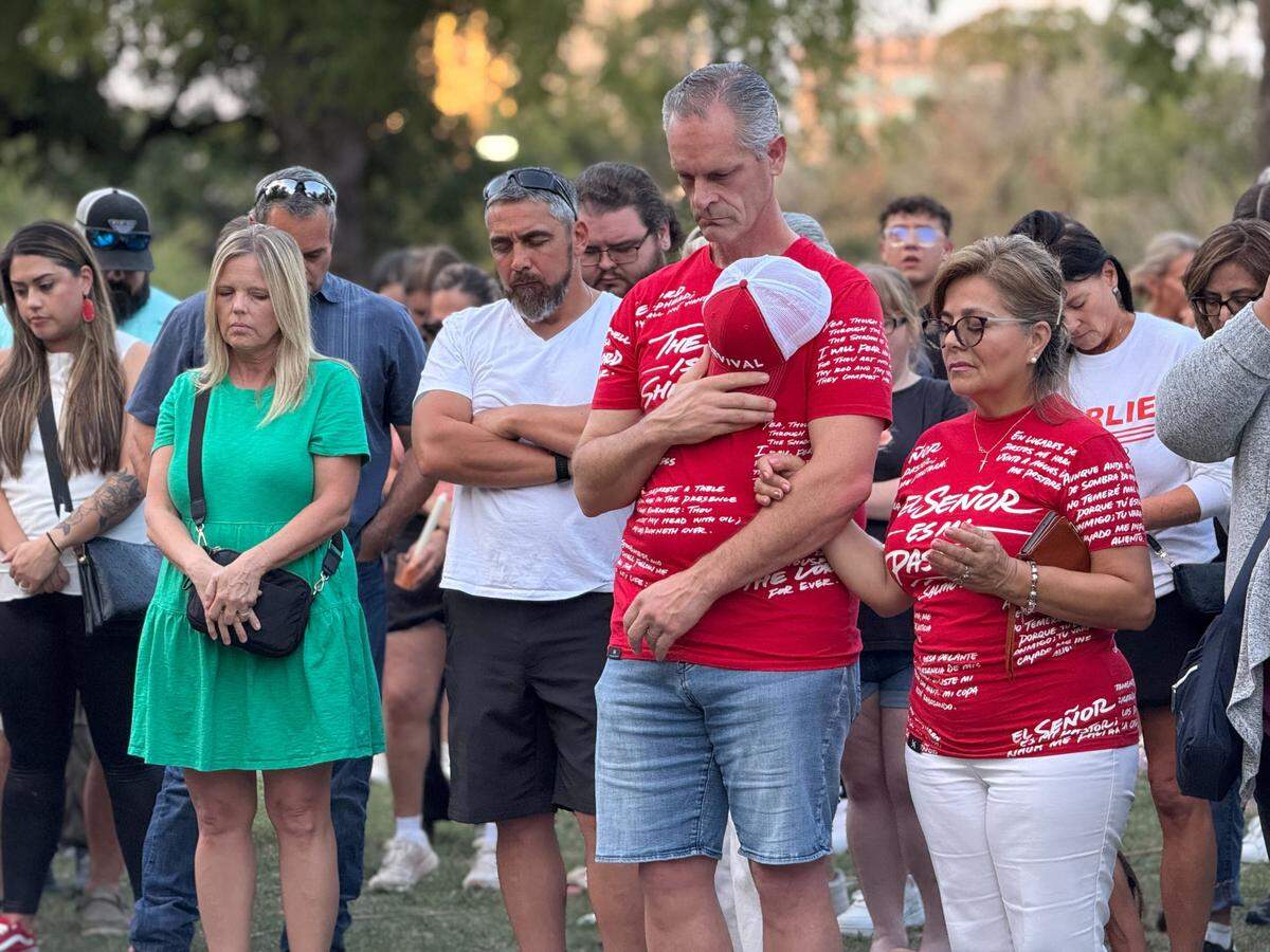 About 1,000 North Texans prayed at a vigil for Charlie Kirk on Sunday night, Sept. 14, at Trinity Park in Fort Worth.