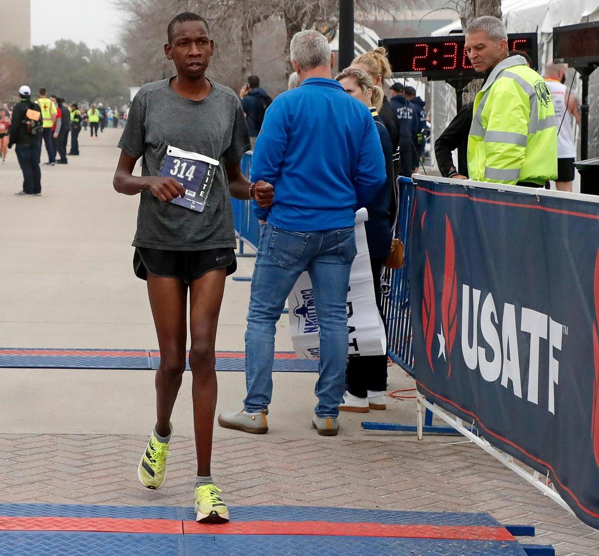 Edward Kandle took home second in the mens marathon with a time of 2:36.53 during the 2023 Cowtown Marathon in Fort Worth, Texas, Sunday, Feb. 26, 2023. Almost 21,000 runners registered for the two day event. (Special to the Star-Telegram Bob Booth)