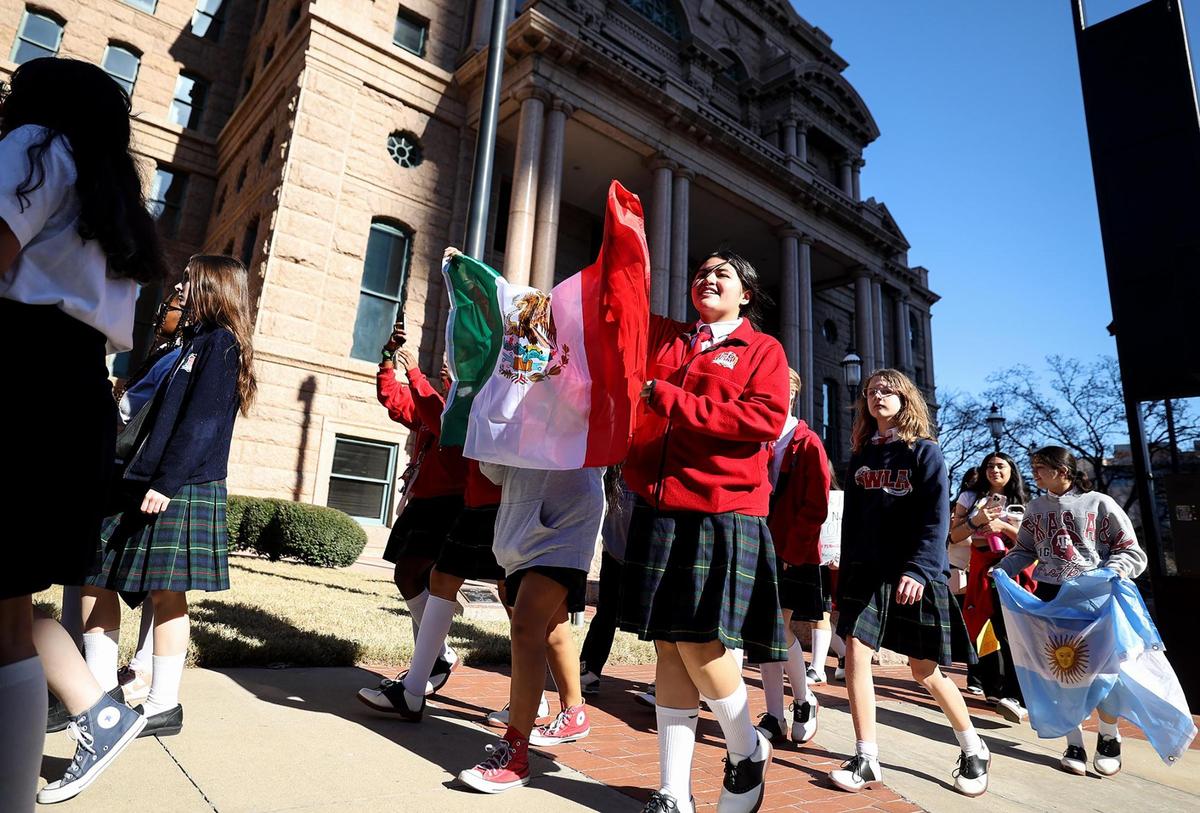 Students at Young Women’s Leadership Academy in downtown Fort Worth walk out of school on Monday, Feb. 3, to protest federal immigration policies they say are harming their families.