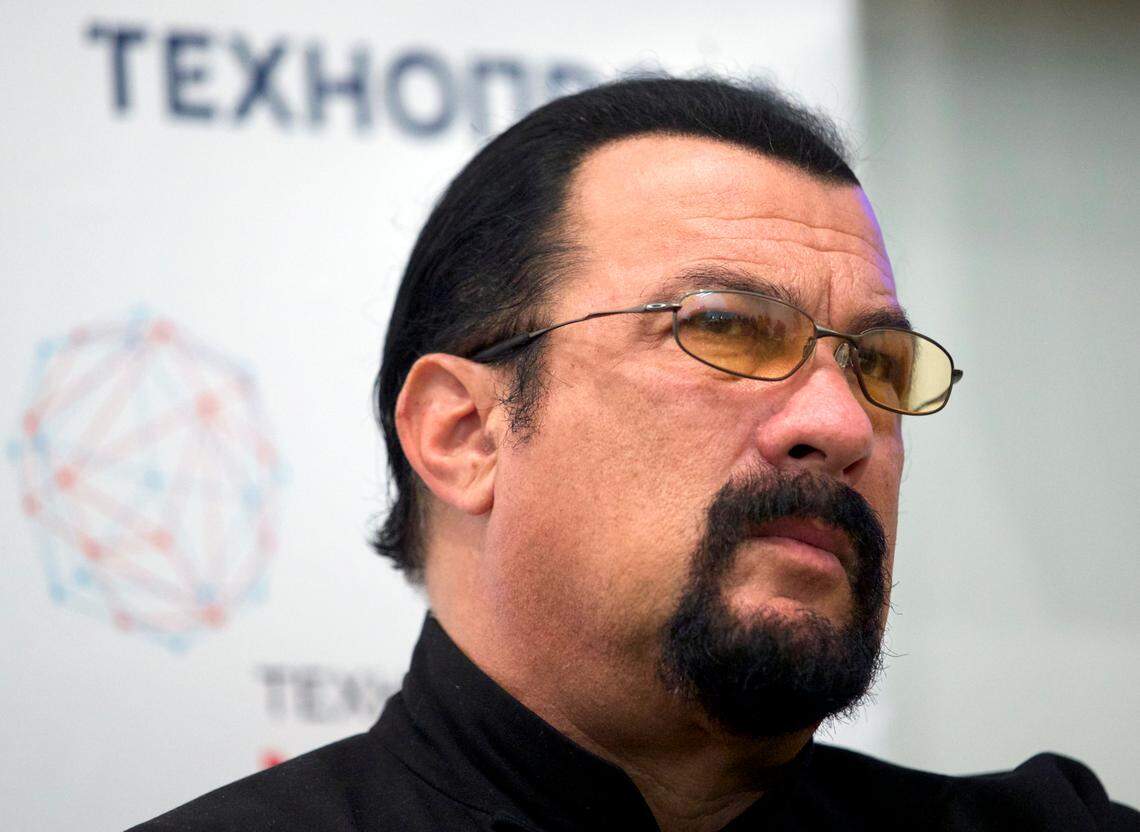 FILE - In this Sept. 22, 2015, file photo, actor Steven Seagal speaks at a news conference, while attending an opening ceremony for a research and development center in Moscow, Russia. (AP Photo/Ivan Sekretarev, File)
