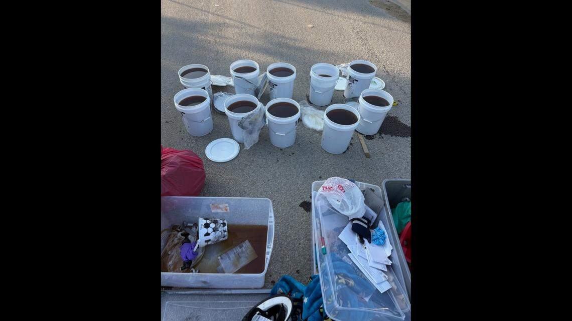 Buckets of liquid methamphetamine seized by the Fort Worth Police Department during investigation of a car crash on Thursday, April 16, 2026.
