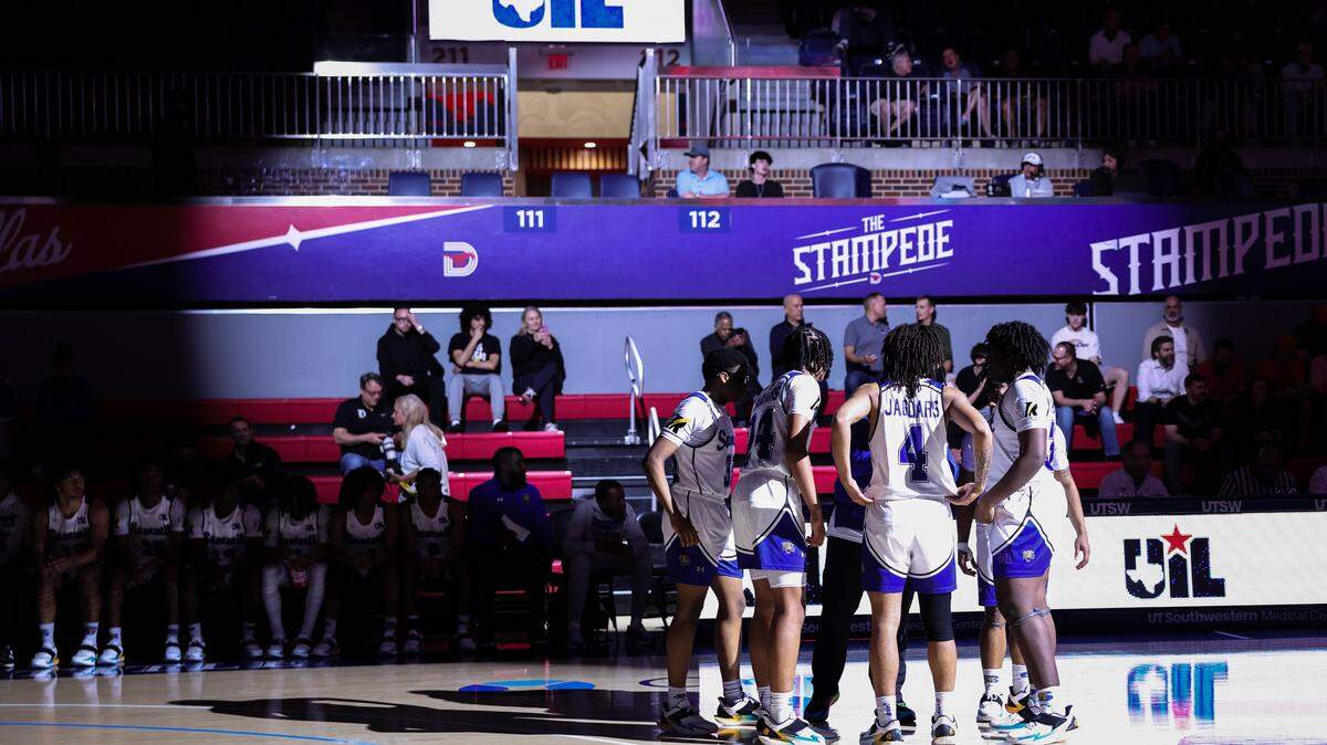 Mansfield Summit starters huddle with head coach Emund Prichett on the court before a Class 5A Division II state semifinal against Lucas Lovejoy on Tuesday at Moody Coliseum in Dallas.