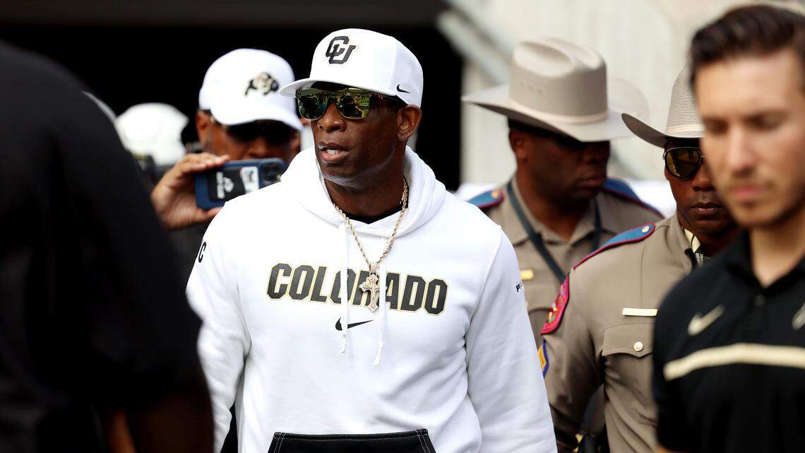 Colorado head coach Deion Sanders, AKA as Coach Prime, takes the field with his team during the season opener against TCU on Saturday, September 2, 2023, at Amon G. Carter Stadium in Fort Worth.
