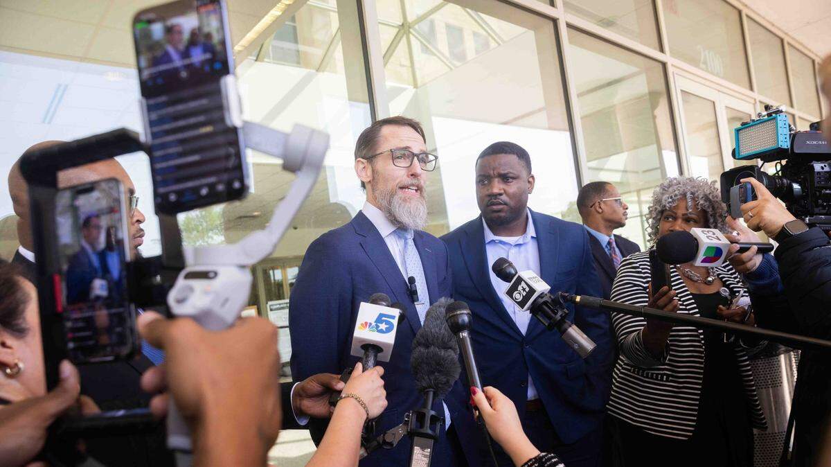 From left, Mike Howard, attorney for Karmelo Anthony, speaks to reporters as Dominique Alexander, president and CEO of Next Generation Action Network, stands next to him following a bond hearing in Anthony’s case at the Collin County Courthouse in McKinney, Texas, on Monday, April 14, 2025. Karmelo Anthony, 17, a Frisco Centennial High School student and football player, is accused of stabbing Austin Metcalf, also 17, to death at a track meet on April 2.