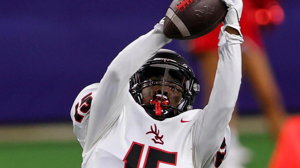 Burleson receiver Aswan Bonner goes up to make a reception against Centennial during the first half, Thursday night, September 24, 2020 played at AT&T Stadium in Arlington, TX. (Steve Nurenberg Special to the Star-Telegram)