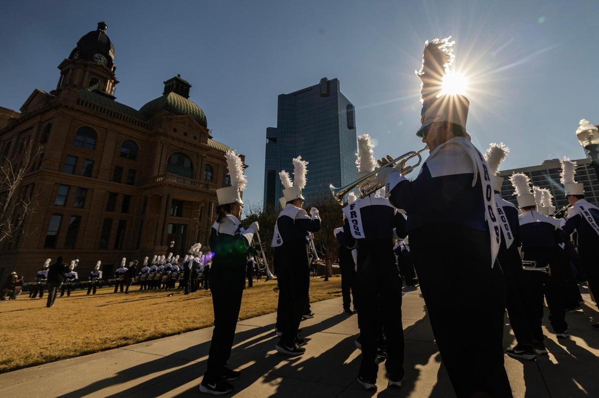 TCU Marching Band member Jackson Schneider practices his trumpet routine prior to the Fort Worth Stockshow All Western Parade in downtown Fort Worth on Saturday, Jan. 18, 2025.