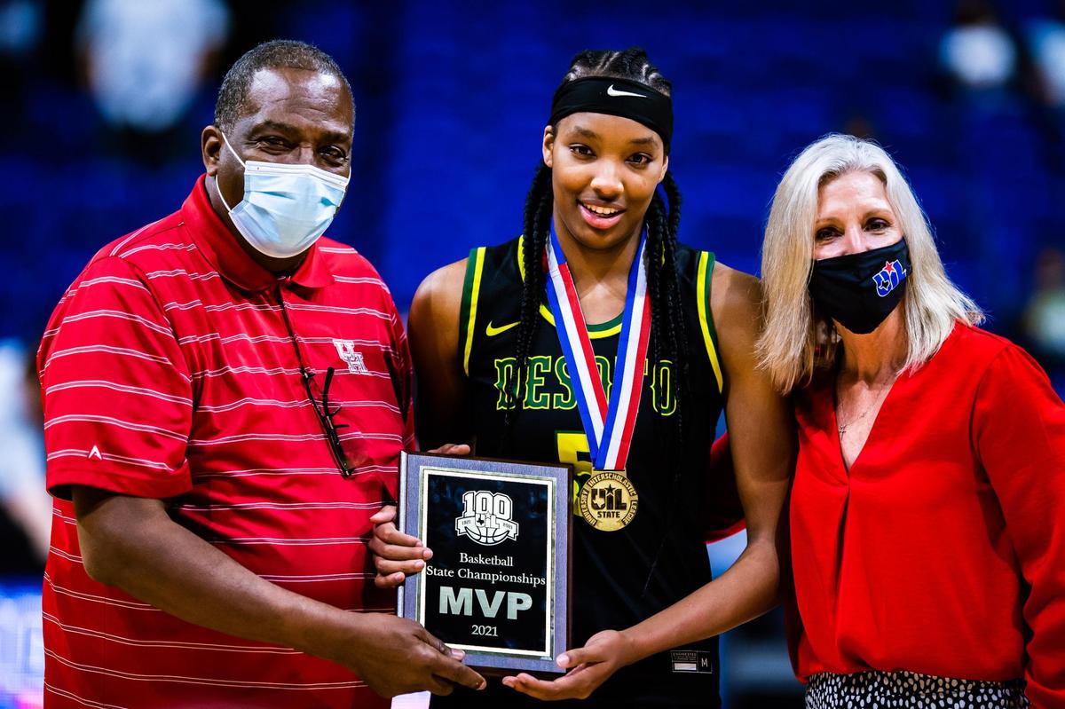 6A MVP Sa’Myah Smith receives her plaque after DeSoto beat Cypress Creek 53-37 at the Alamodome in San Antonio Texas, on March 11, 2021. (Photo by Matt Smith. Special to the Star-Telegram).
