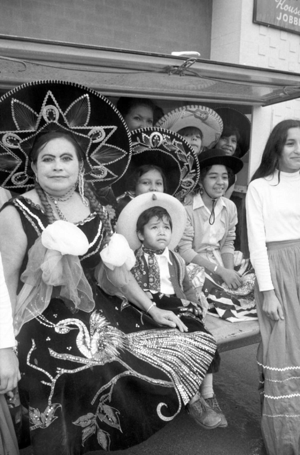 Sept. 14, 1974: Mexican Independence Day parade in Fort Worth. The Cerda family, watching the parade, is seen dressed in traditional Mexican attire.