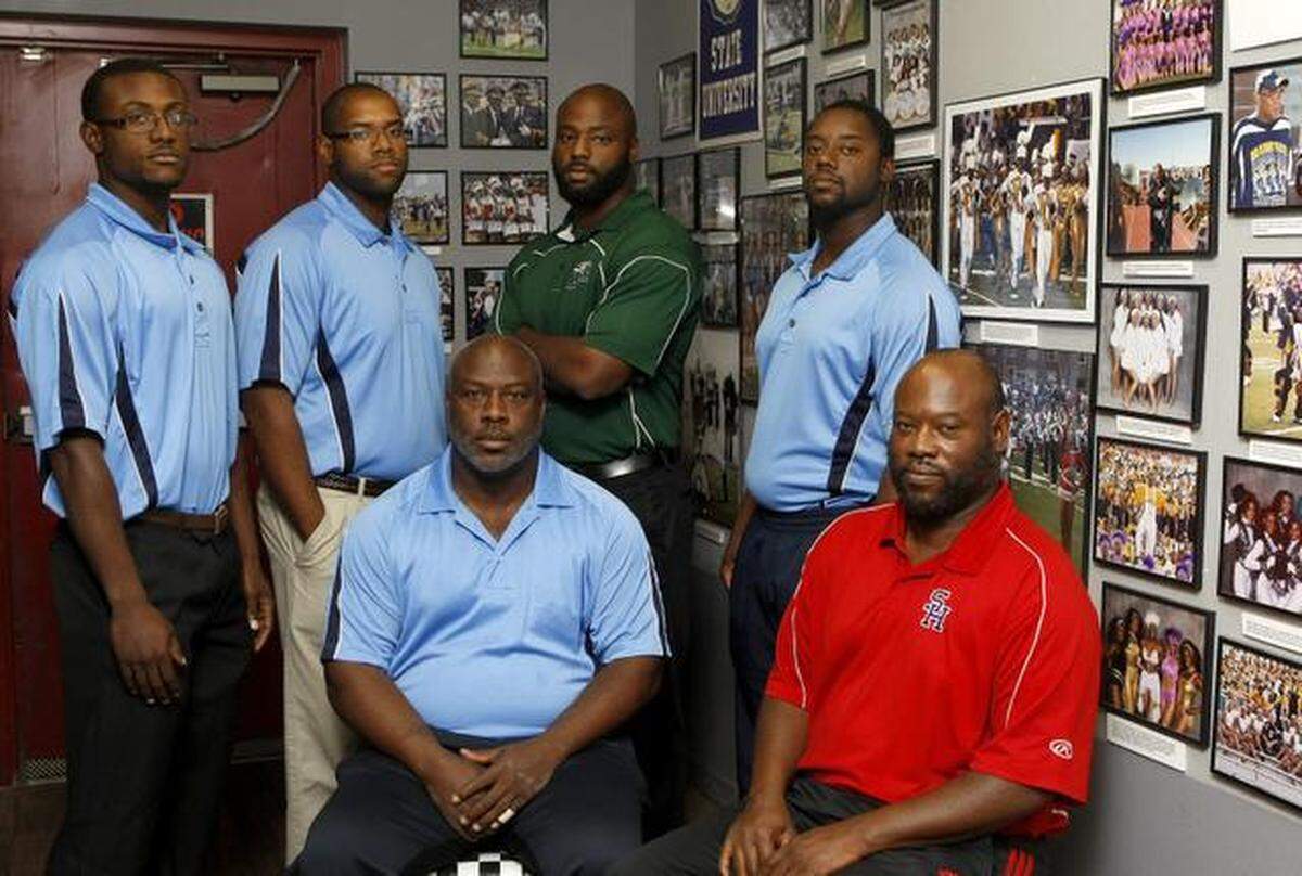 From left to right are high school coaches Meyer Criss, Quinnin Criss, Zachary Criss, Antwaun Criss, Dominique Criss, and Anthony Criss. (Star-Telegram/Khampha Bouaphanh)