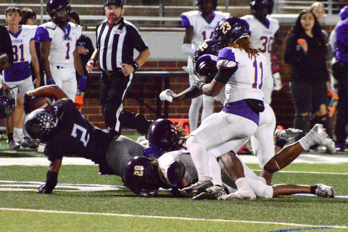 Mansfield Summit running back Ian Gebhardt stretches for yardage against Everman on Thursday, Oct. 31, 2024 at Newsom Stadium in Mansfield, Texas.